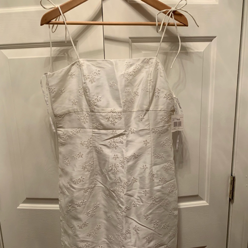 Short, white eye-let dresss